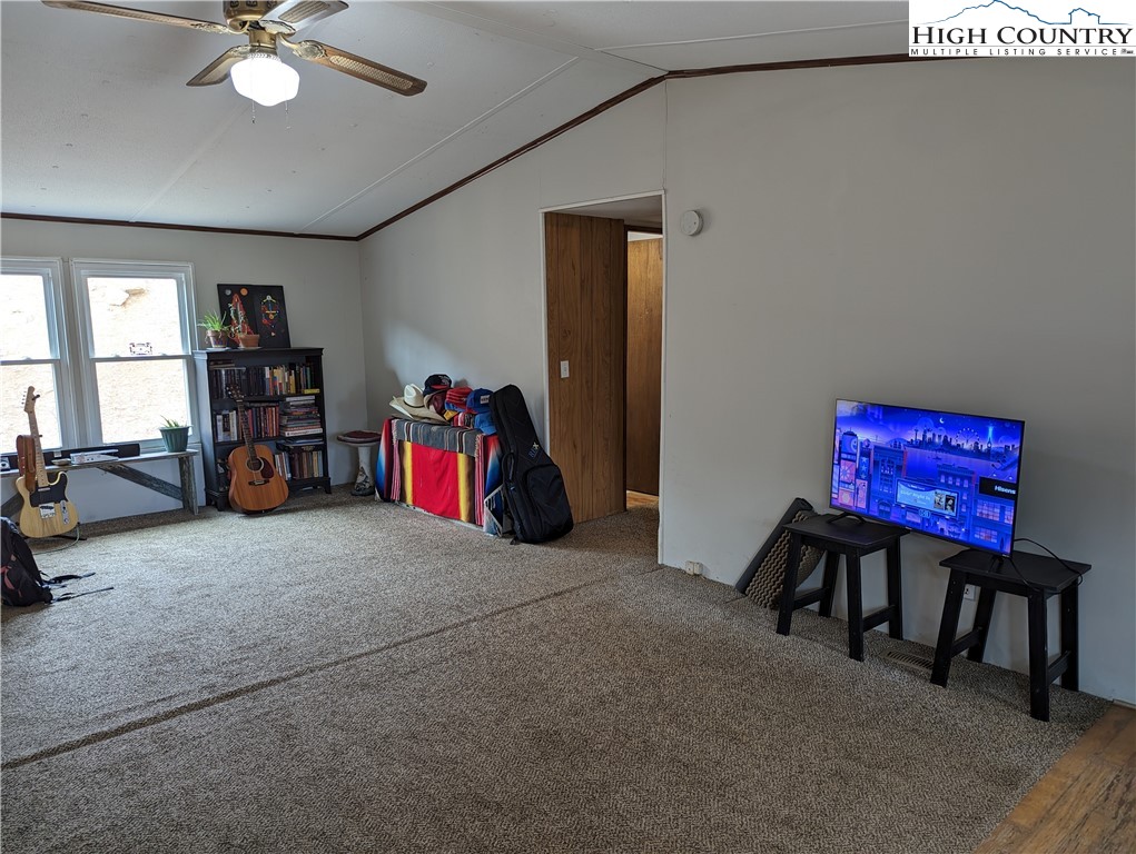 330 Sugarworth Mountain Road Boone, NC 28607 - Photo 22 of 43 a living room with furniture and a flat screen tv