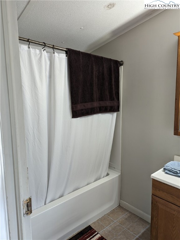 330 Sugarworth Mountain Road Boone, NC 28607 - Photo 30 of 43 a bathroom with a bathtub and a shower