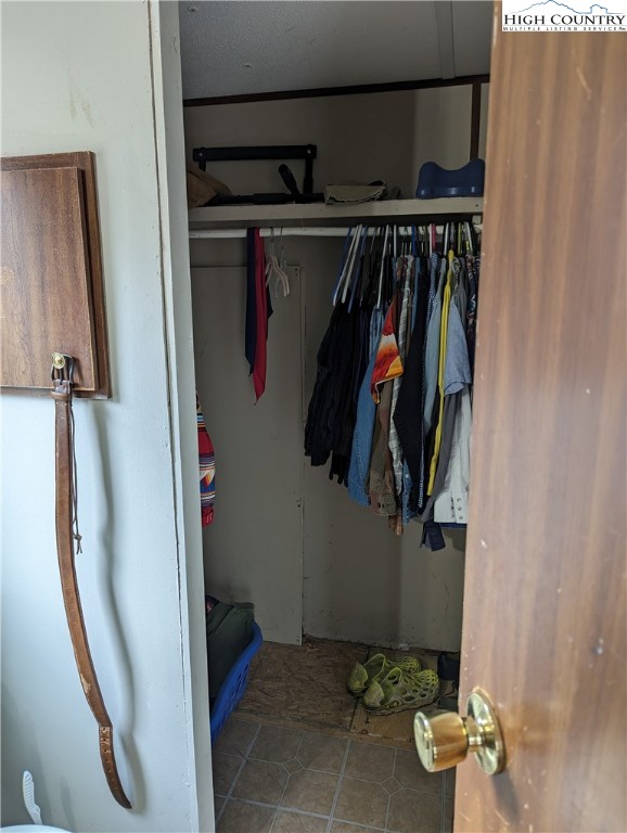 330 Sugarworth Mountain Road Boone, NC 28607 - Photo 34 of 43 a view of walk in closet with clothes and shoes
