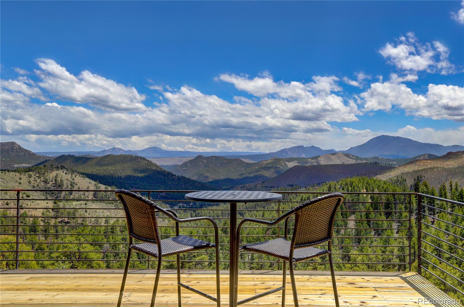 31995 Half Peak Trail Pine, CO 80470 - Photo 14 of 40 a view of a terrace