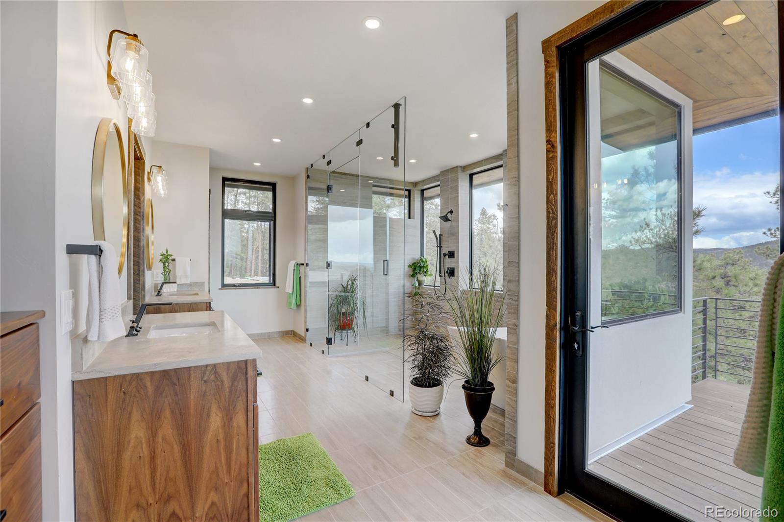 31995 Half Peak Trail Pine, CO 80470 - Photo 18 of 40 a view of a bathroom from the hallway