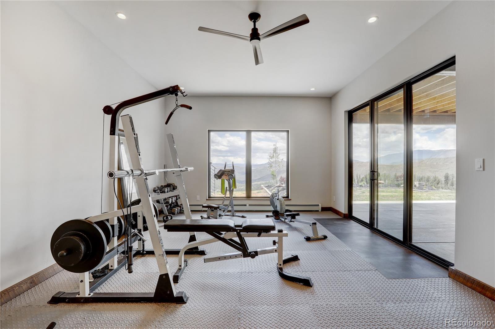 31995 Half Peak Trail Pine, CO 80470 - Photo 32 of 40 a view of a room with gym equipment