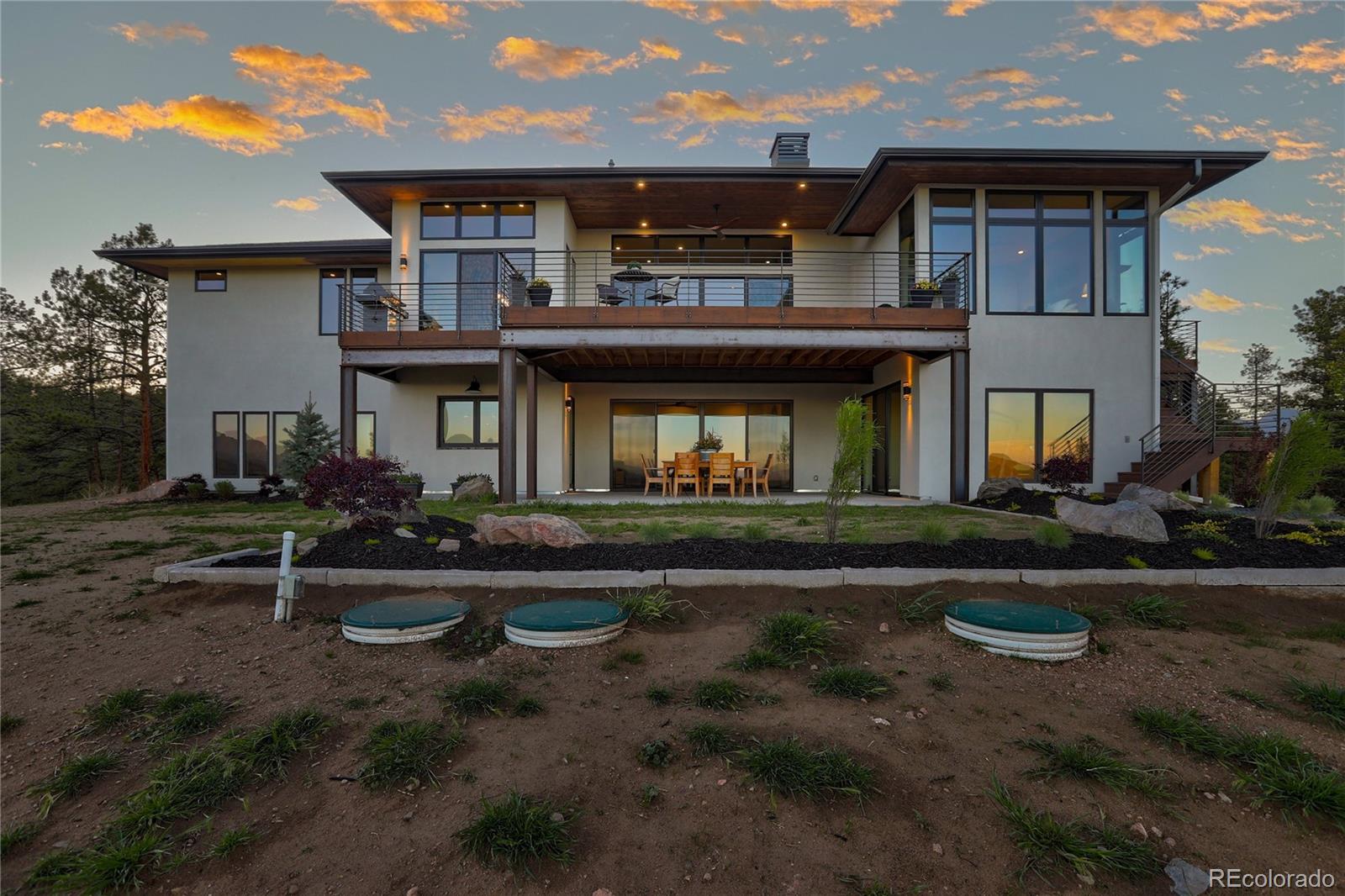 31995 Half Peak Trail Pine, CO 80470 - Photo 33 of 40 front view of a house with swing