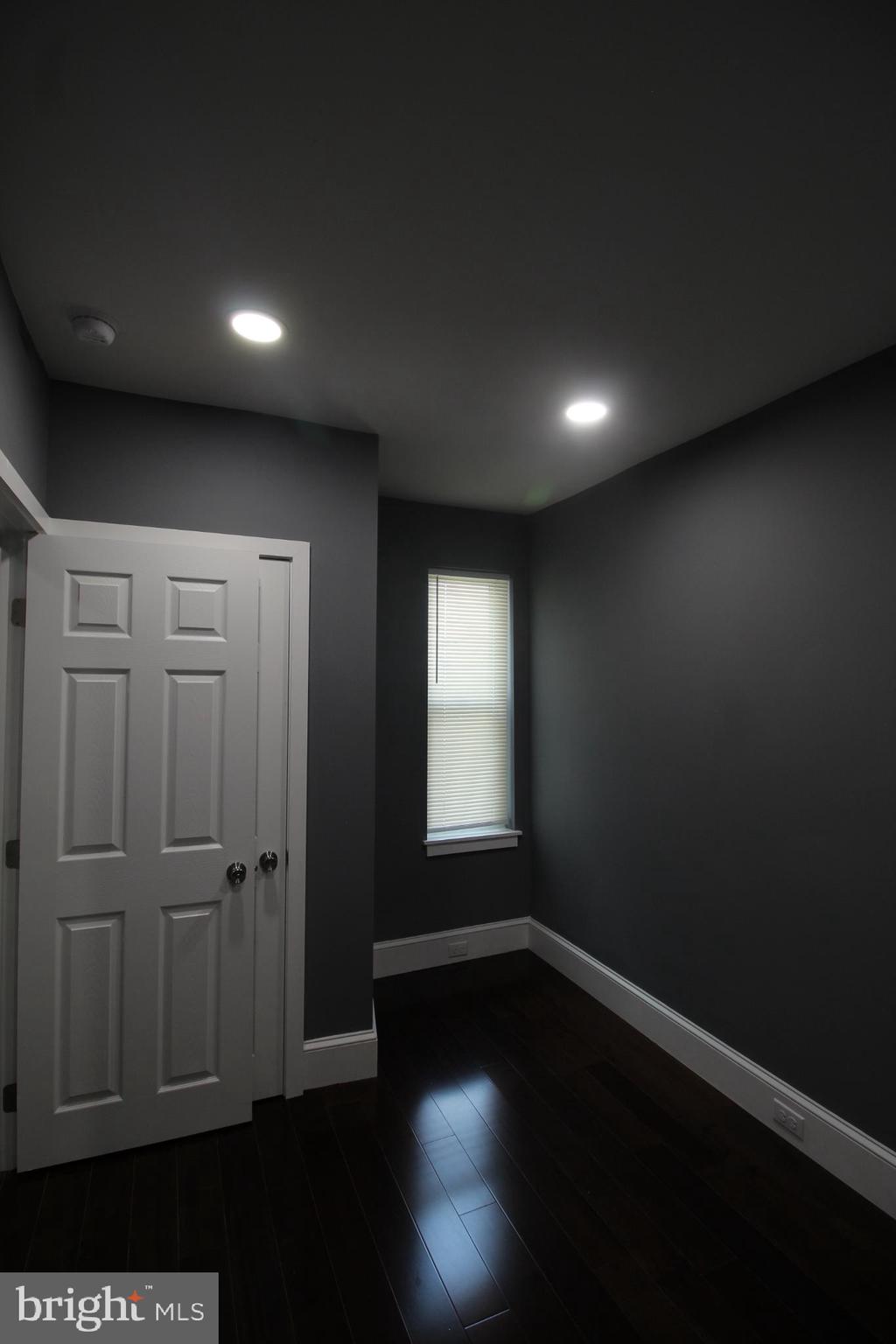 3086 Memphis Street Philadelphia, PA 19134 - Photo 13 of 18 an empty room with wooden floor and windows