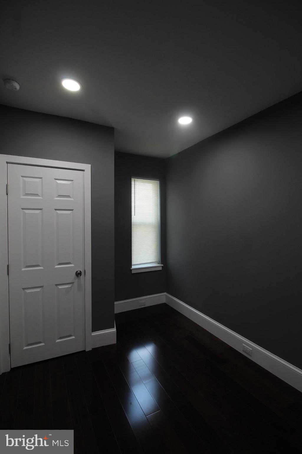 3086 Memphis Street Philadelphia, PA 19134 - Photo 14 of 18 a view of an empty room with wooden floor and a window