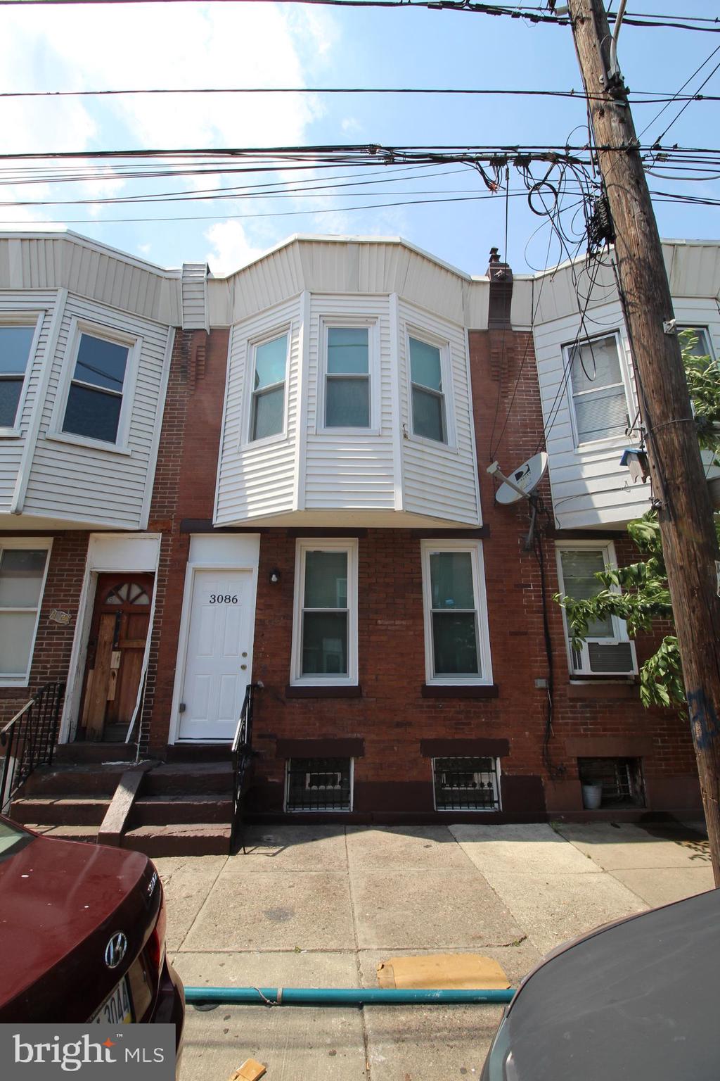 3086 Memphis Street Philadelphia, PA 19134 - Photo 18 of 18 a front view of a multi story residential apartment building
