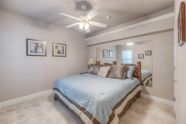 a bathroom with cabinets and a sink
