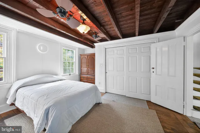 a view of a entryway with furniture and a window