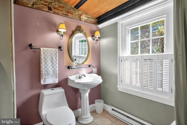 a view of a balcony with wooden floor