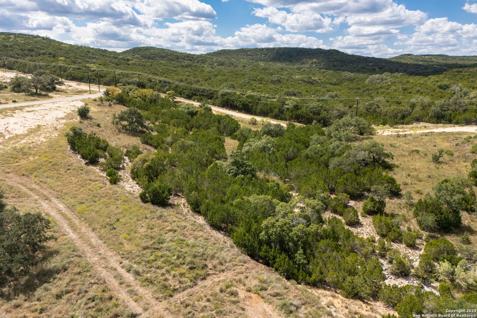 11309 Sloanes Ridge San Antonio, TX 78255 - Photo 3 of 19 a view of a lake with a mountain
