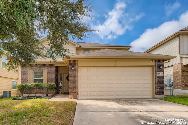 10714 Ranchland Fox San Antonio, TX 78245 - Photo 2 of 24 a front view of a house with a yard