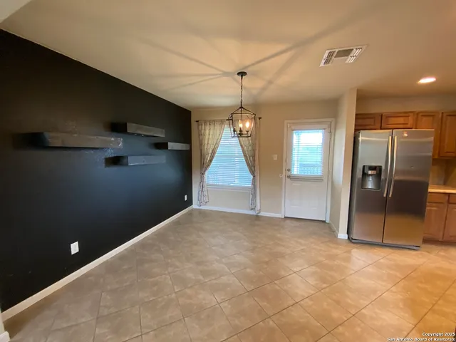 a view of a livingroom with a staircase