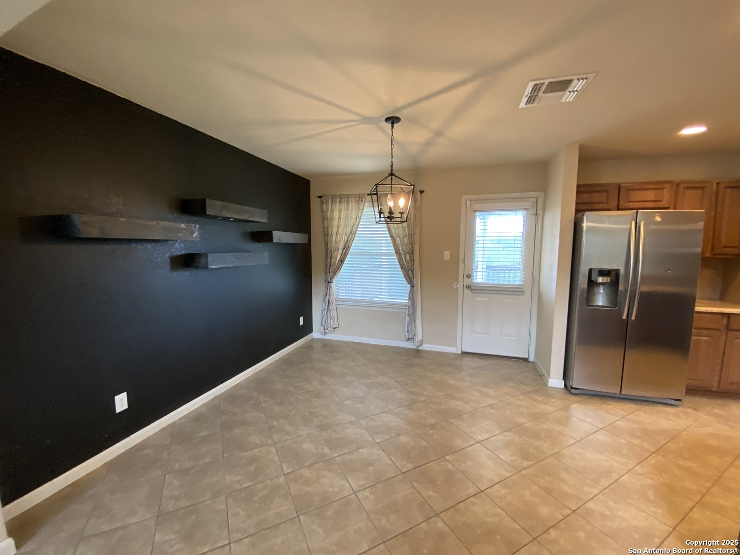 10714 Ranchland Fox San Antonio, TX 78245 - Photo 8 of 24 a view of a livingroom with a staircase