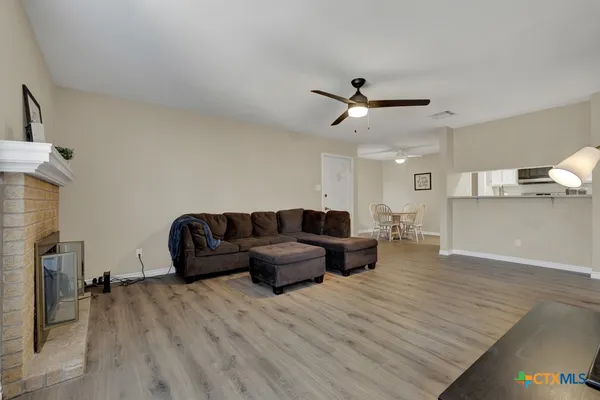 a living room with furniture and a table
