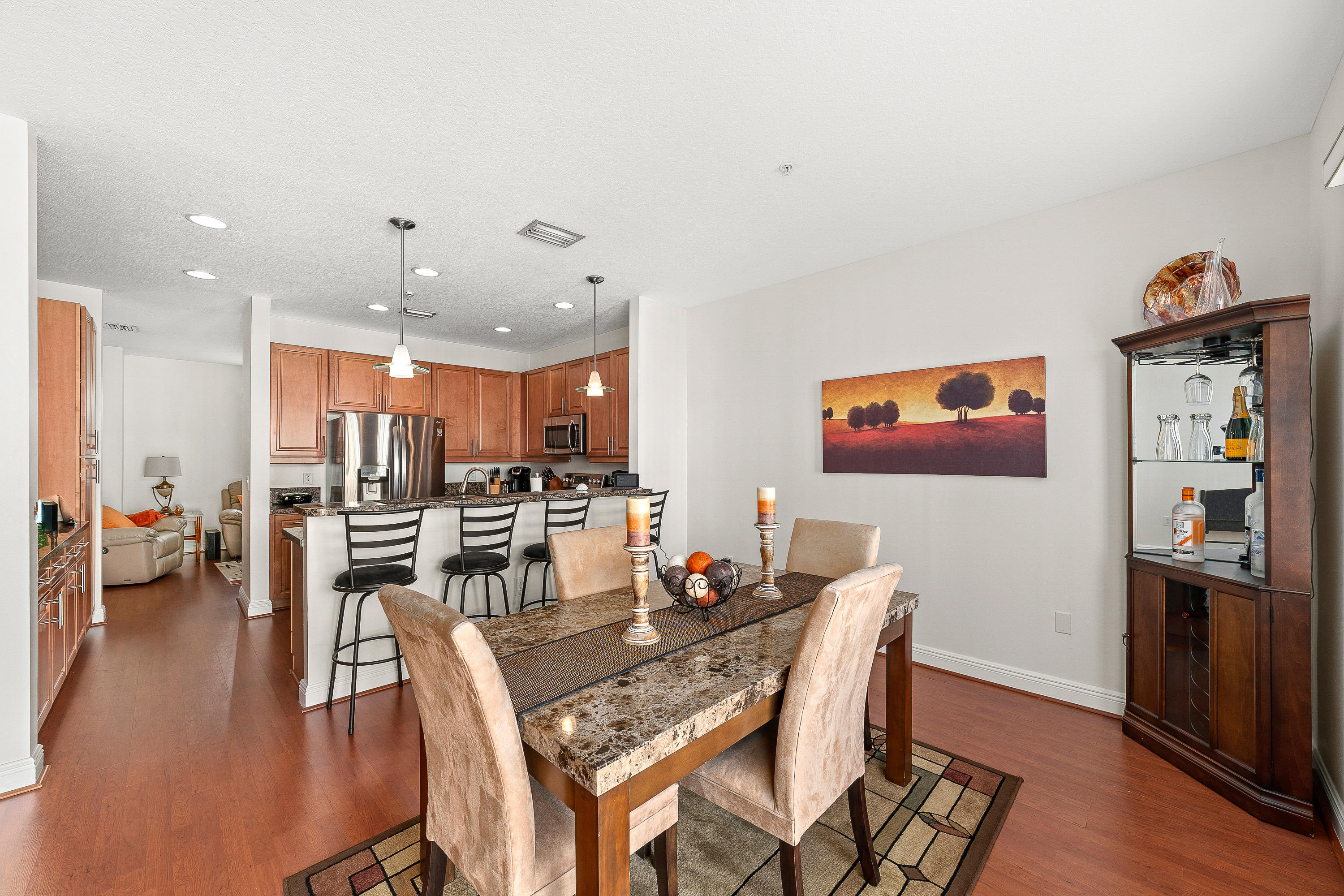 613 Northwest 38th Circle Boca Raton, FL 33431 - Photo 16 of 31 a view of a dining room with furniture kitchen and wooden floor