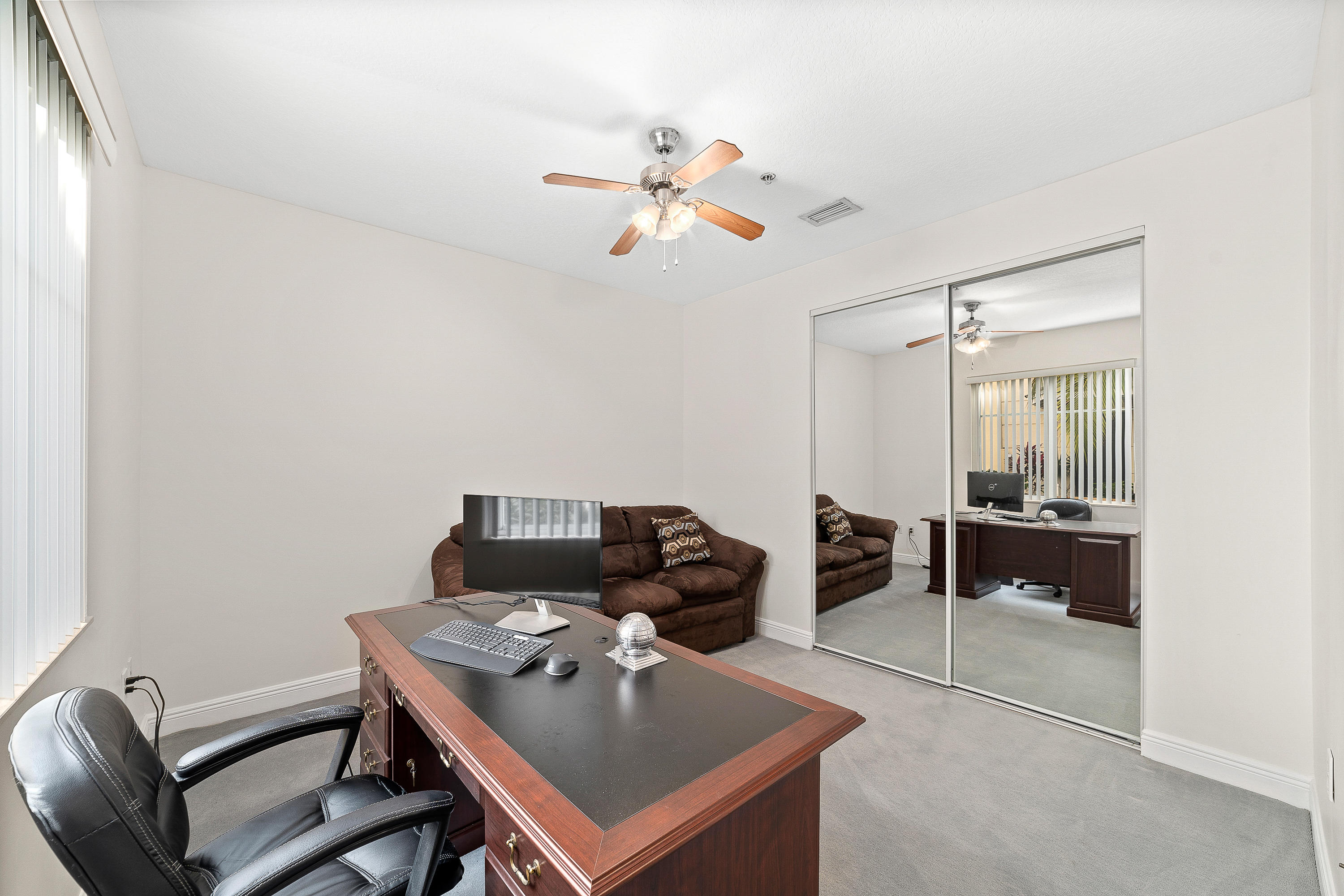 613 Northwest 38th Circle Boca Raton, FL 33431 - Photo 25 of 31 a view of a workspace with furniture and window