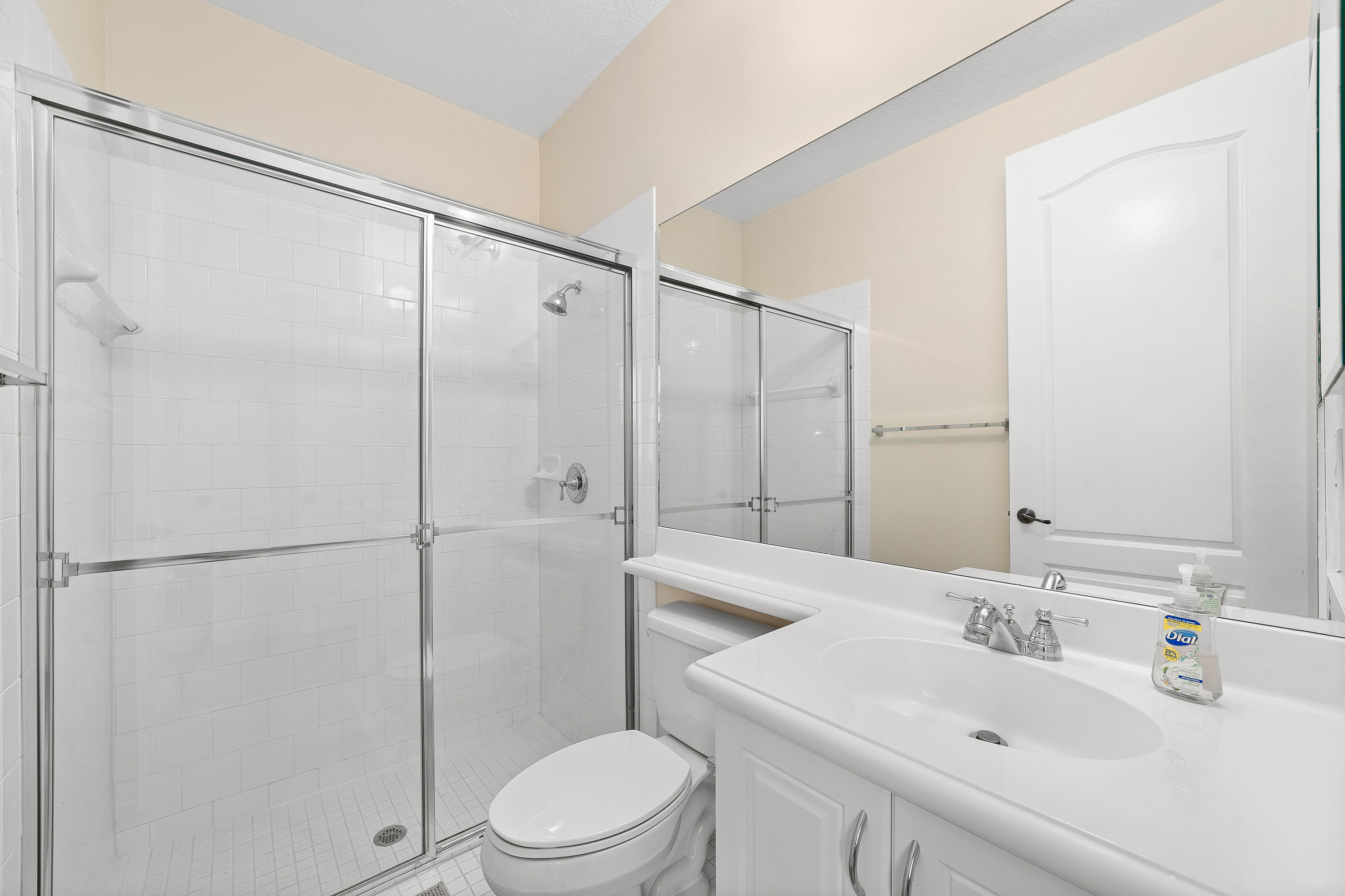 613 Northwest 38th Circle Boca Raton, FL 33431 - Photo 27 of 31 a bathroom with a sink toilet and shower