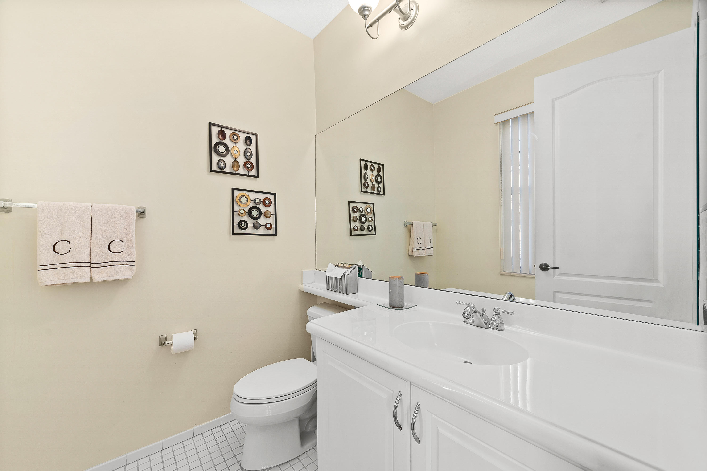 613 Northwest 38th Circle Boca Raton, FL 33431 - Photo 31 of 31 a bathroom with a sink and a toilet