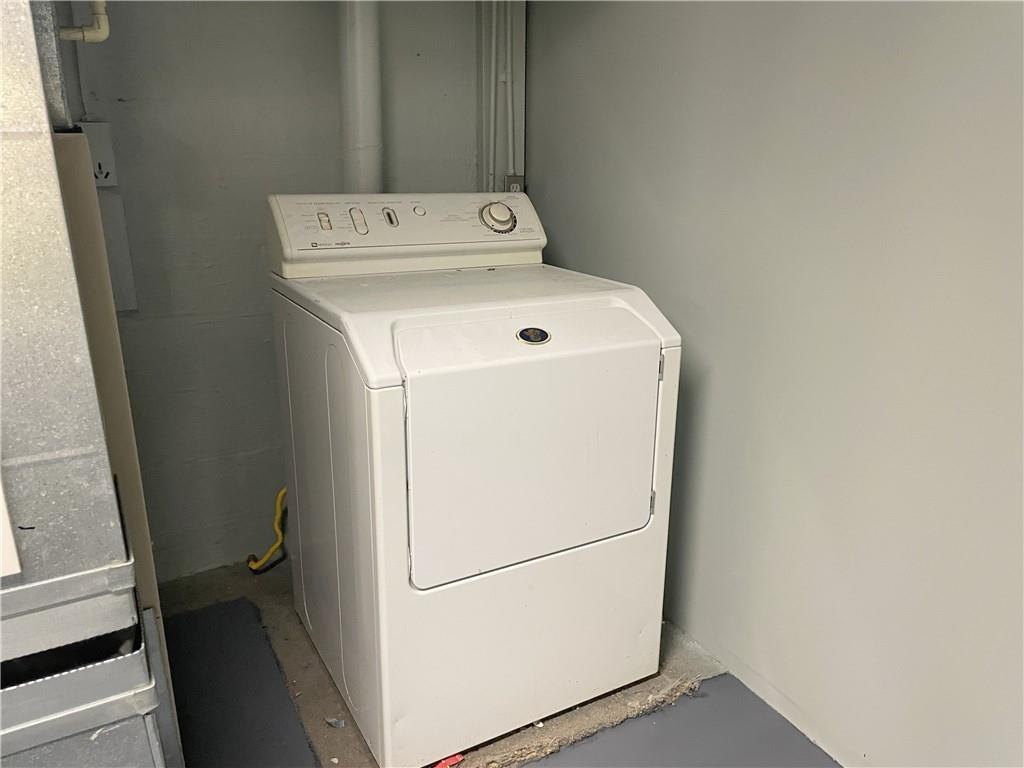 1658 Pulaski Road New Castle, PA 16105 - Photo 19 of 21 a utility room with dryer and washer