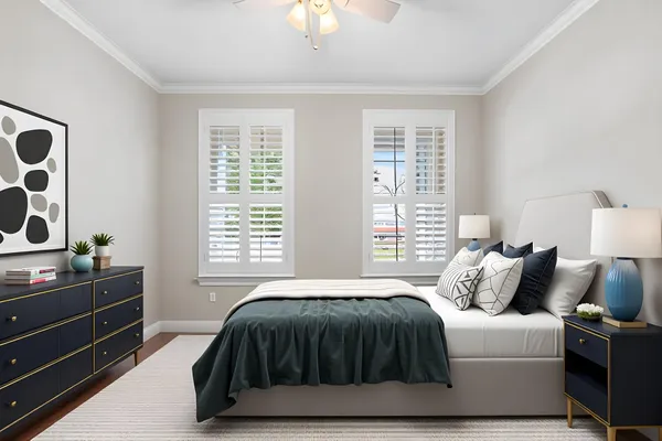 a bedroom with a bed and window