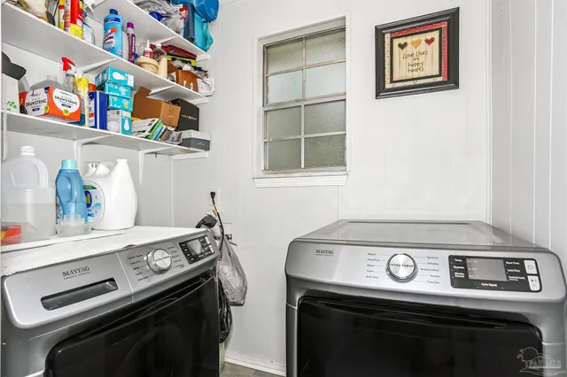 a view of a stove top oven sitting inside of a kitchen