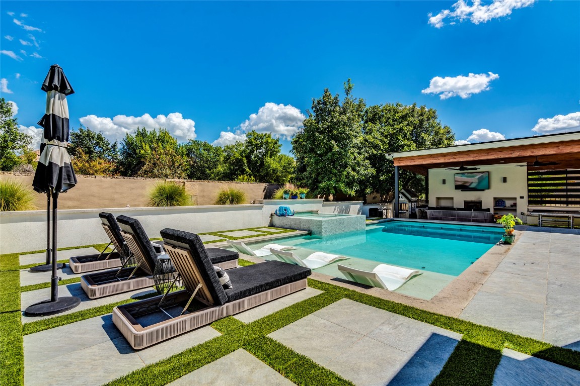 109 Bisset Court Austin, TX 78738 - Photo 4 of 34 a view of a swimming pool with a patio