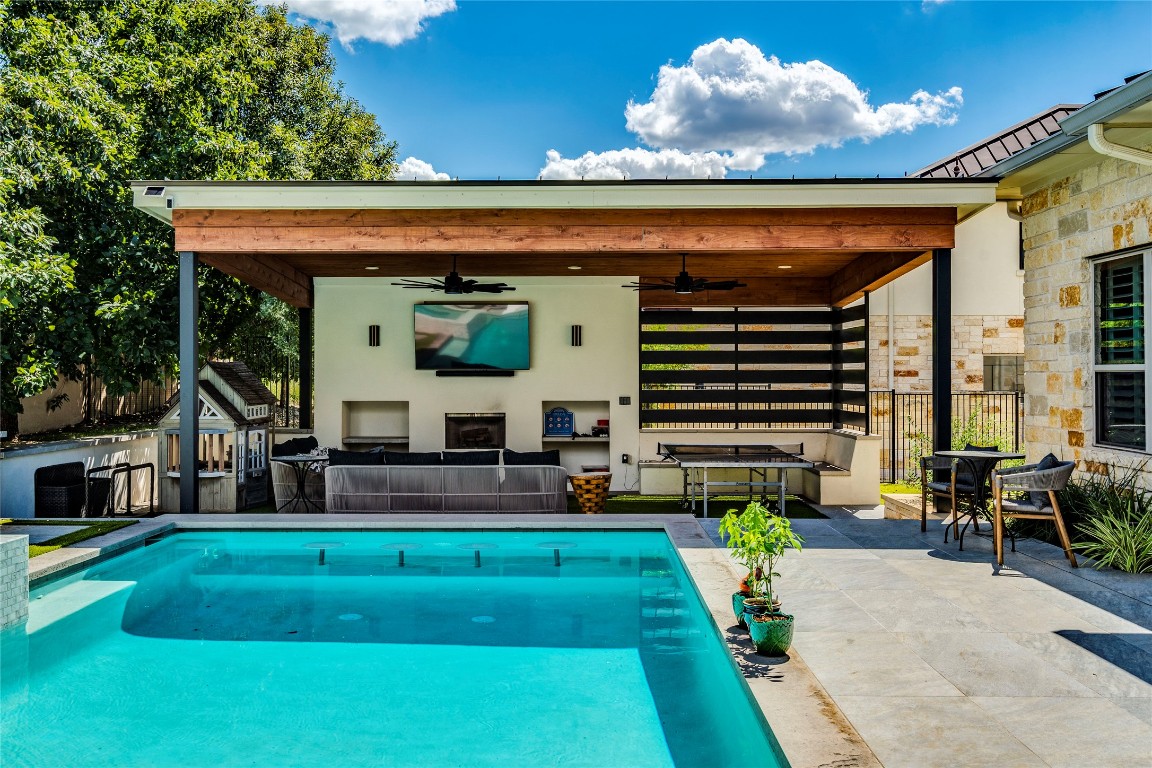 109 Bisset Court Austin, TX 78738 - Photo 6 of 34 a front view of a house with a yard balcony