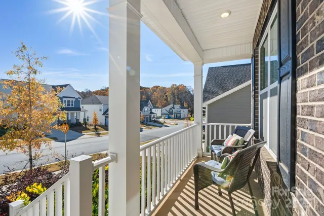 a view of balcony with furniture