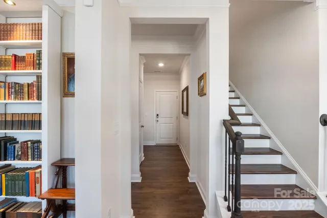 a living room with a bed and furniture