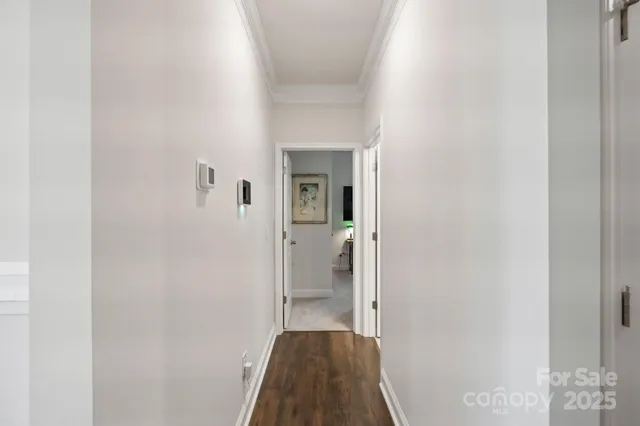 a bathroom with a granite countertop sink toilet a mirror and shower
