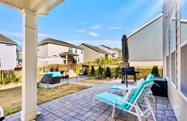 a view of a swimming pool with a patio