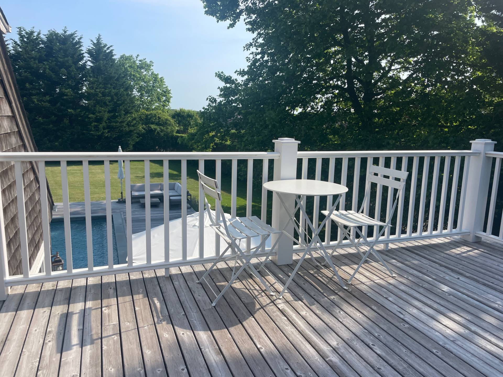 761 North Sea Mecox Road Southampton, NY 11968 - Photo 15 of 22 a view of balcony with wooden floor and fence