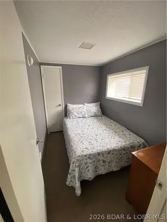 $300,000 | 33510 Bass Point Road, Unit 38 & 39, Gravois Mills, MO 65037
