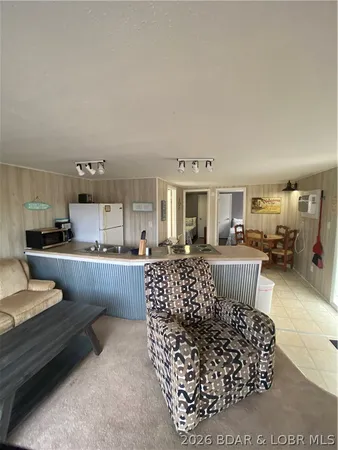 $300,000 | 33510 Bass Point Road, Unit 38 & 39, Gravois Mills, MO 65037