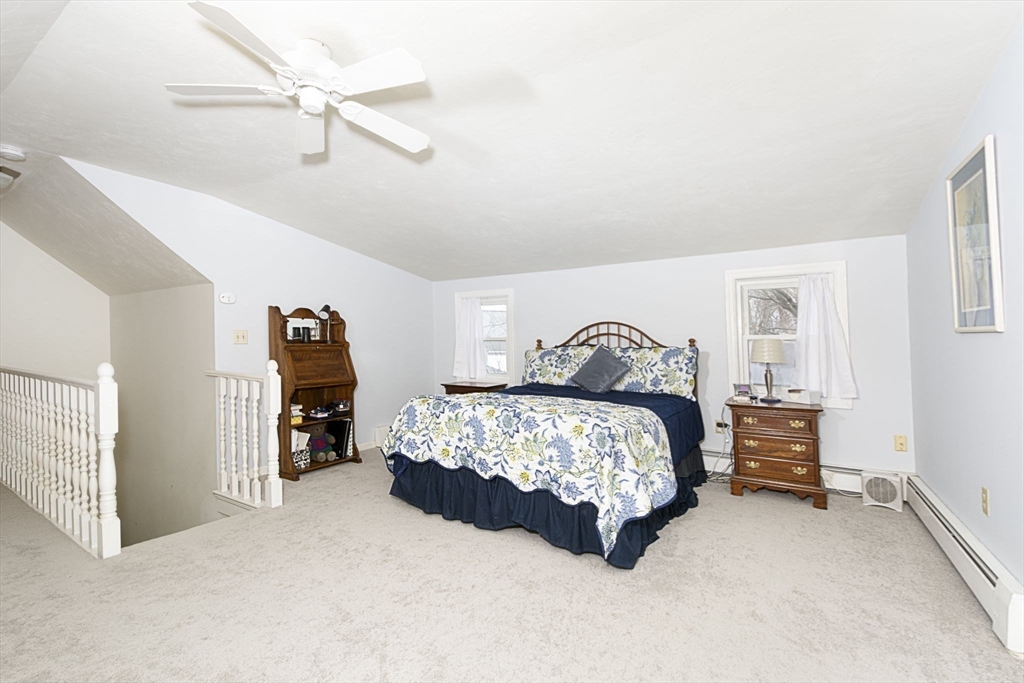 15 Monroe Street Shrewsbury, MA 01545 - Photo 15 of 30 a bedroom with a bed and dresser