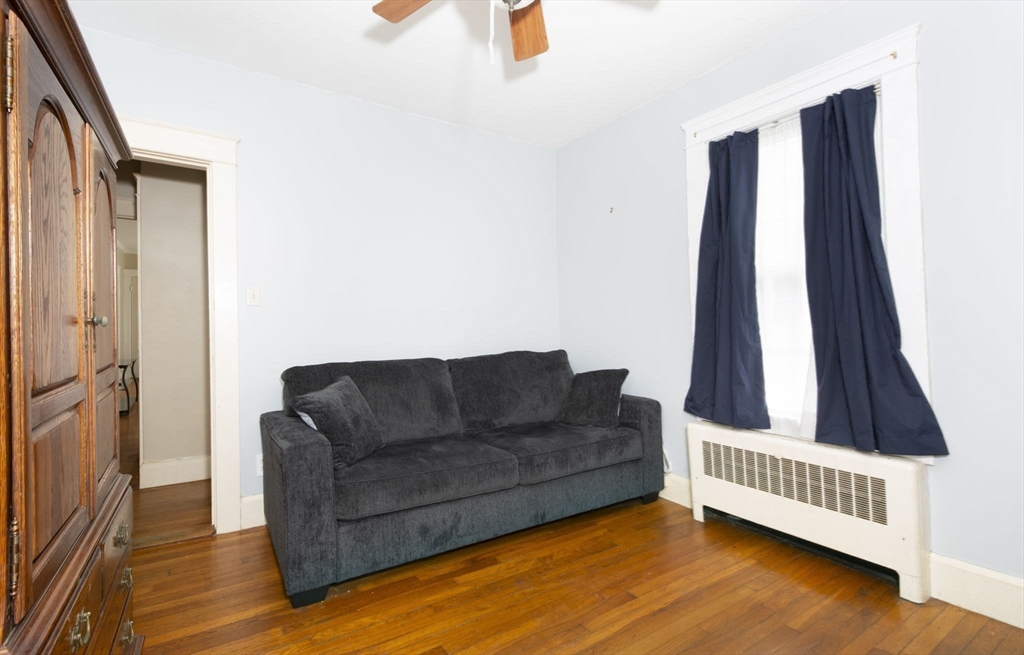 15 Monroe Street Shrewsbury, MA 01545 - Photo 19 of 30 a living room with furniture and wooden floor