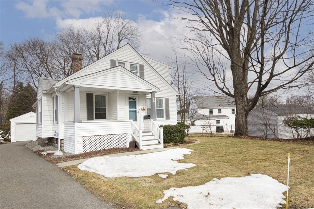 15 Monroe Street Shrewsbury, MA 01545 - Photo 25 of 30 a front view of a house with a yard covered with snow