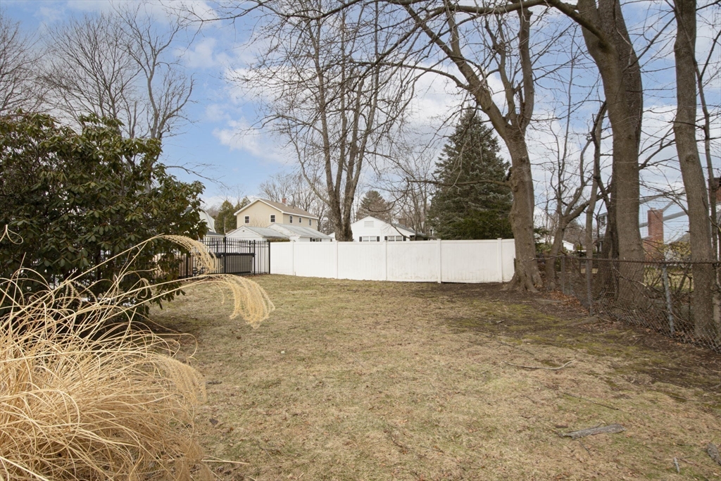 15 Monroe Street Shrewsbury, MA 01545 - Photo 26 of 30 a view of yard covered with snow in front of house