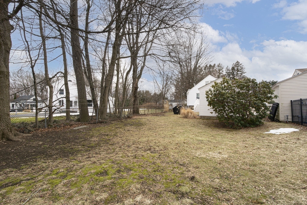 15 Monroe Street Shrewsbury, MA 01545 - Photo 28 of 30 a view of yard covered with snow in front of house