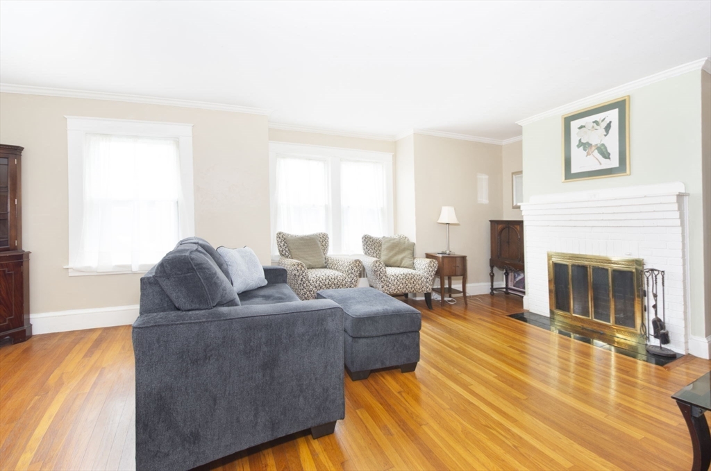 15 Monroe Street Shrewsbury, MA 01545 - Photo 3 of 30 a living room with furniture and a fireplace