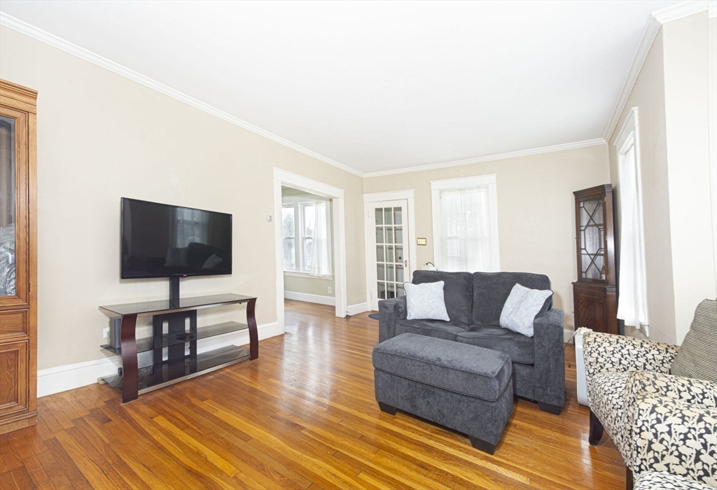 15 Monroe Street Shrewsbury, MA 01545 - Photo 5 of 30 a living room with furniture and a flat screen tv