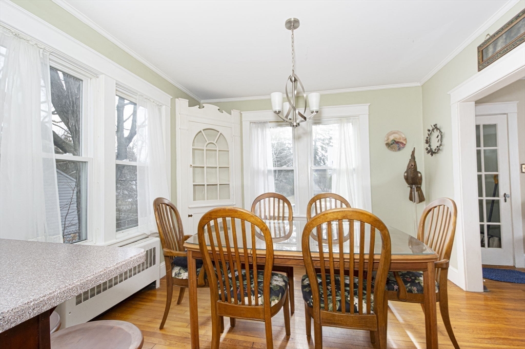 15 Monroe Street Shrewsbury, MA 01545 - Photo 7 of 30 a view of a dining room with furniture window and wooden floor