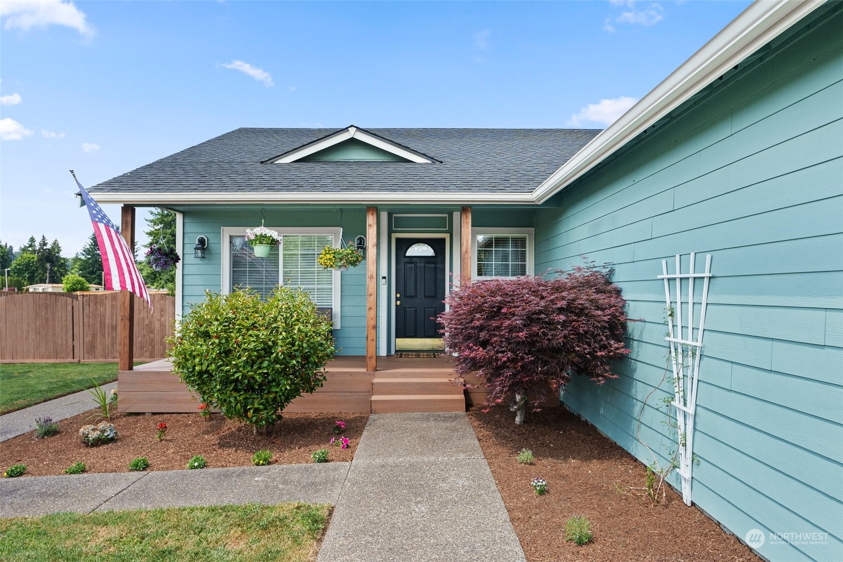 19930 Tahoma Circle Southwest Rochester, WA 98579 - Photo 1 of 29 a view of a house with a small yard and plants