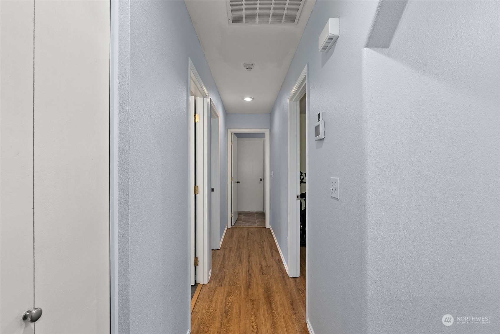 19930 Tahoma Circle Southwest Rochester, WA 98579 - Photo 13 of 29 a view of hallway with wooden floor