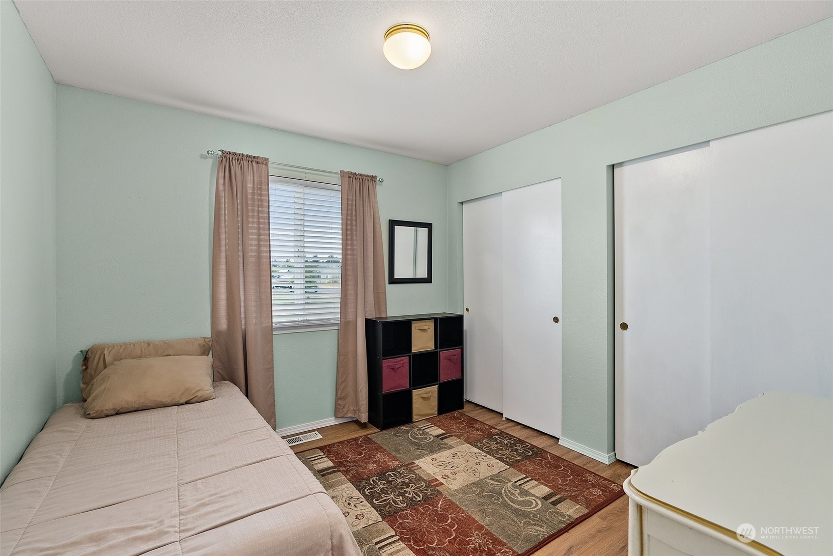 19930 Tahoma Circle Southwest Rochester, WA 98579 - Photo 17 of 29 a bedroom with a bed and a window
