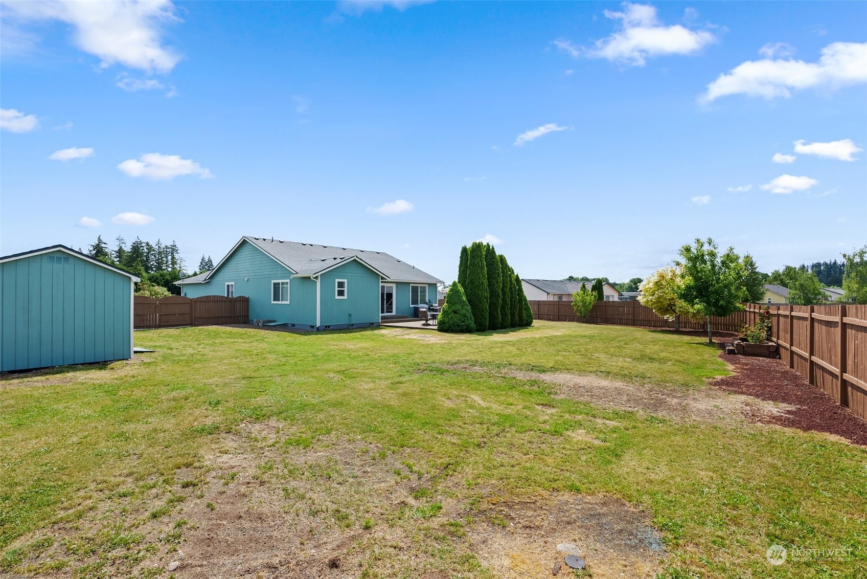 19930 Tahoma Circle Southwest Rochester, WA 98579 - Photo 27 of 29 a house view with a garden space