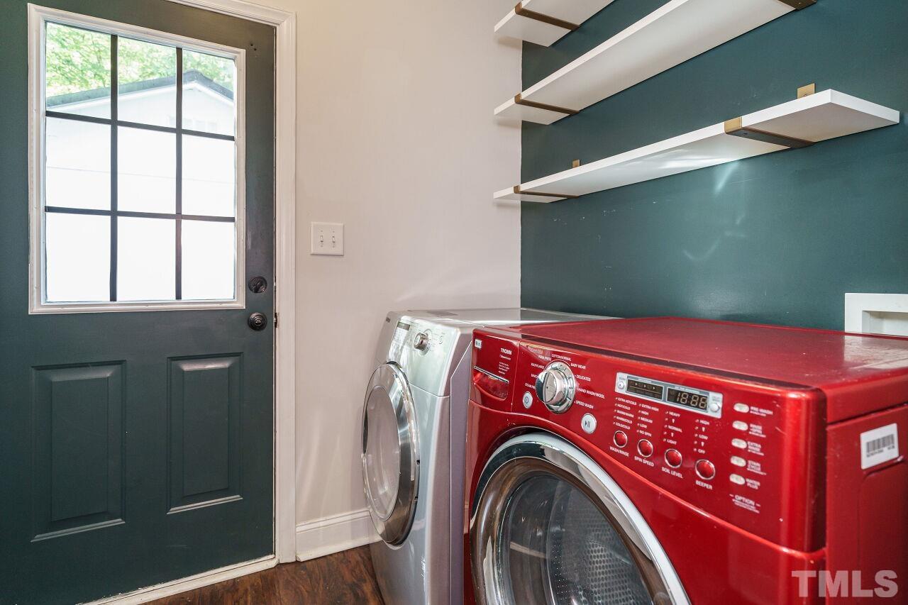 4202 Holt School Road Durham, NC 27704 - Photo 14 of 27 a utility room with dryer and washer