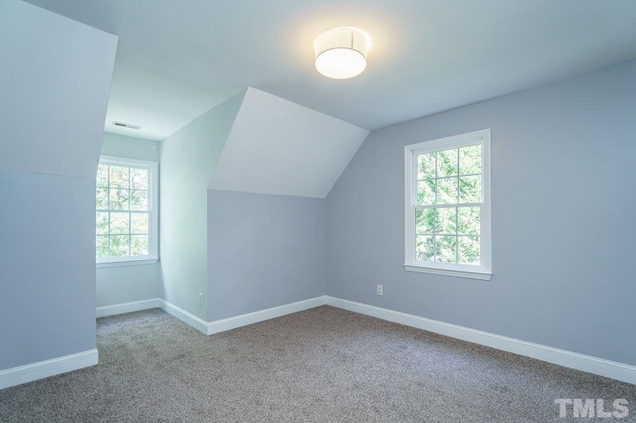4202 Holt School Road Durham, NC 27704 - Photo 20 of 27 an empty room with a window