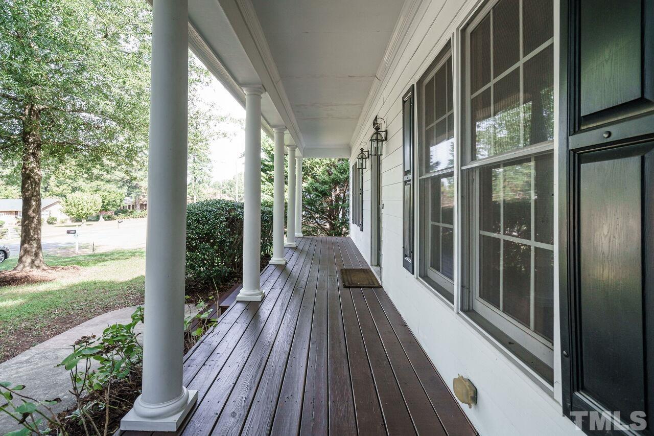 4202 Holt School Road Durham, NC 27704 - Photo 2 of 27 a view of balcony with wooden floor