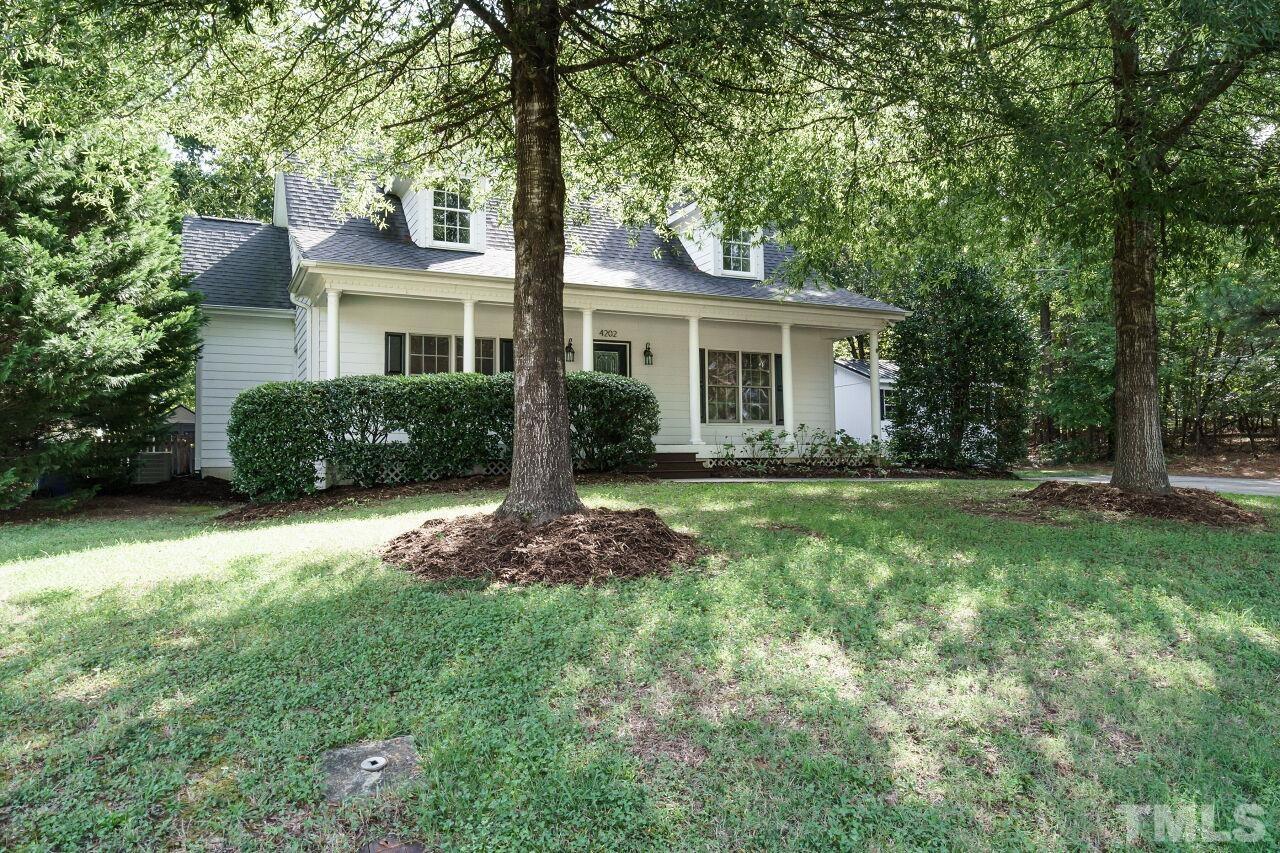 4202 Holt School Road Durham, NC 27704 - Photo 27 of 27 a front view of house with yard and green space